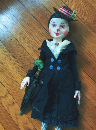 a paperclay and cloth art doll based on the character of mary poppins