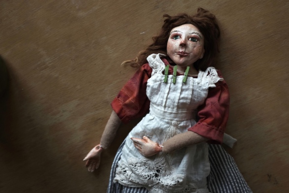 Victorian art doll with a cloth body and paperclay head and hands