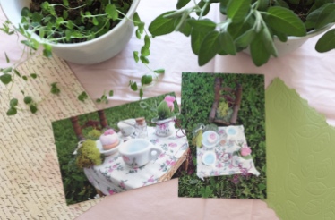 pink and green postcards and letters showing a miniature fairy tea party scene