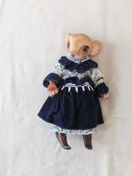 anthropomorphic mouse doll in a blue Victorian dress